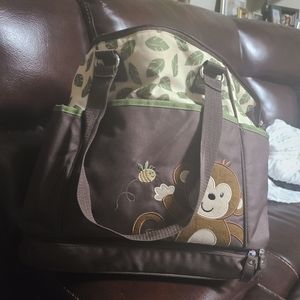 Baby bag with fold up changing pad with to go bed